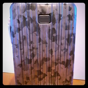 Tumi 22” Black and Gray International Spinner